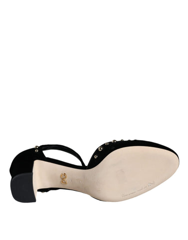 Black velvet roses ankle strap pumps shoes by Dolce & Gabbana with pointed toes and elegant floral embellishments.