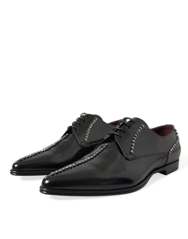 Black leather crystal-embellished formal shoes by Dolce & Gabbana, featuring sleek design and elegant craftsmanship.