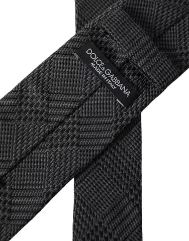 Dark gray silk men's tie with plaid pattern, adjustable fit, by Dolce & Gabbana, featuring a stylish and sophisticated design.