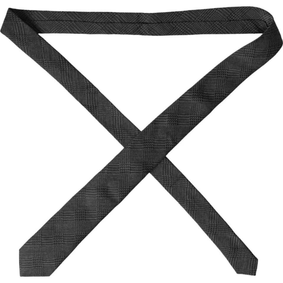 Dark gray silk men's tie with plaid pattern and adjustable strap, by Dolce & Gabbana, displayed against a neutral background.