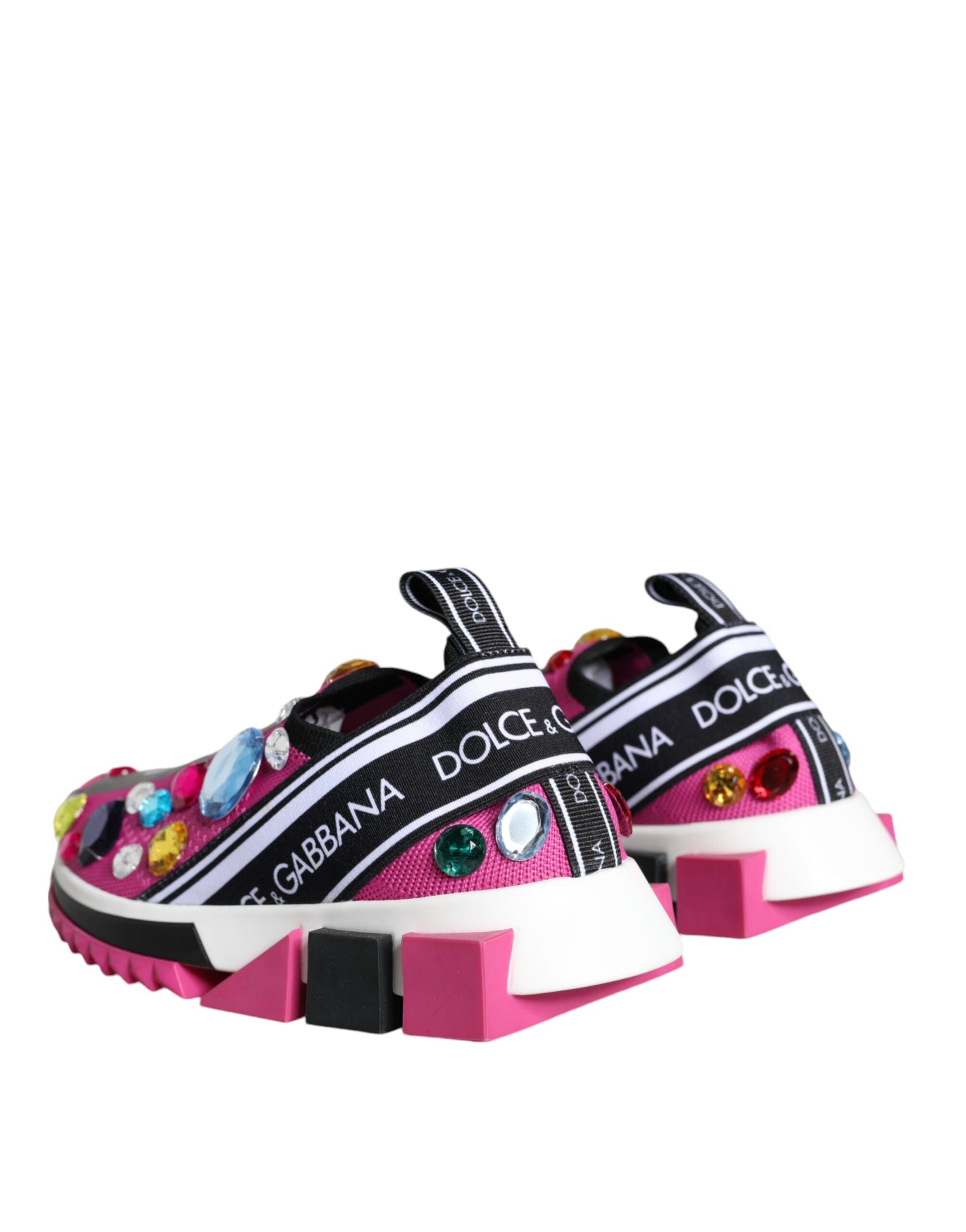 Pink Sorrento Crystals low top sneakers by Dolce & Gabbana with crystal embellishments and white rubber soles.