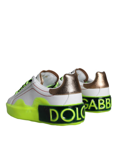 White leather Portofino low top sneakers by Dolce & Gabbana, featuring sleek design and stylish lace-up front.