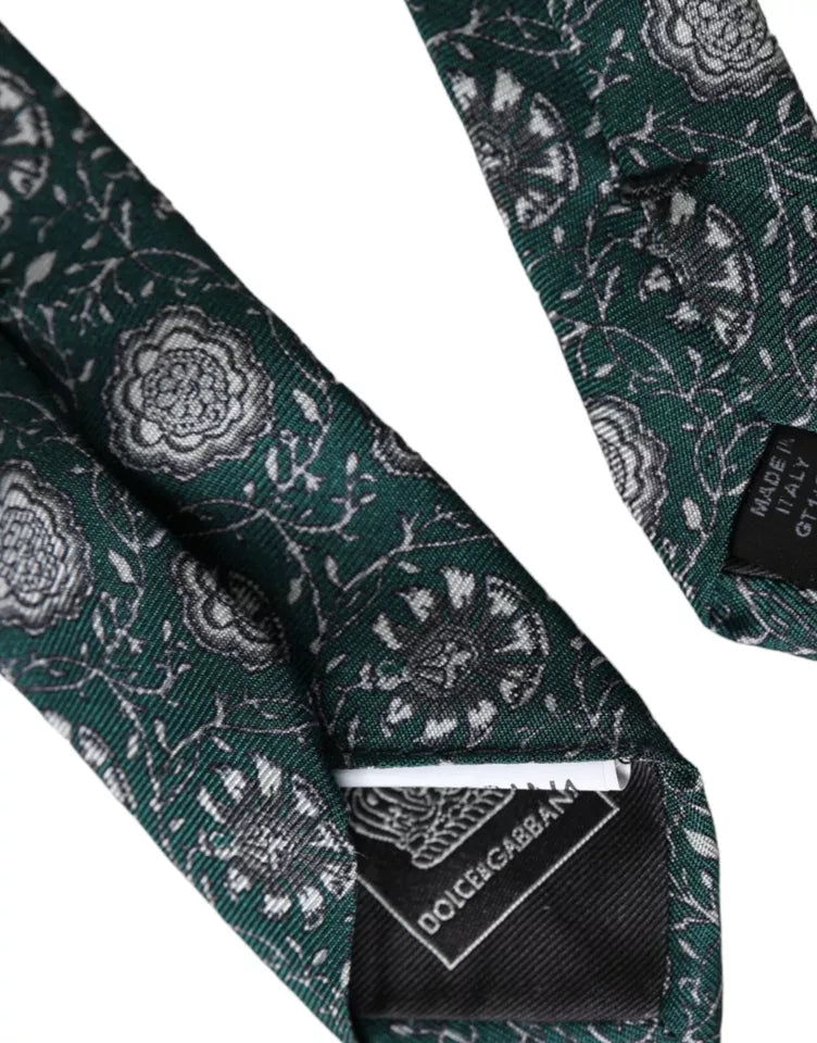 Green floral print silk men's tie by Dolce & Gabbana, featuring an adjustable design and elegant floral pattern.