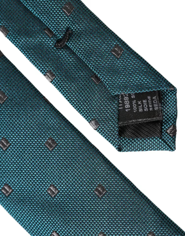 Green patterned silk adjustable men's tie by Dolce & Gabbana, featuring a stylish design and classic knot.