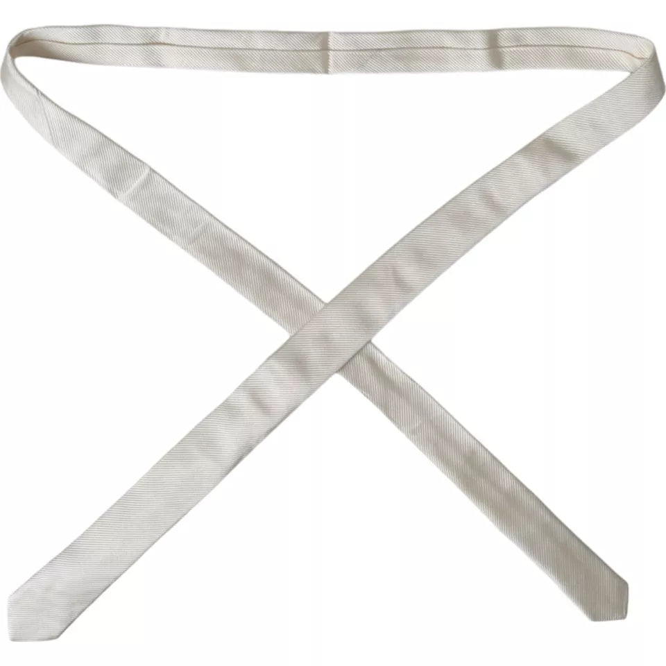 White solid 100% silk adjustable tie by Dolce & Gabbana, showing the smooth, elegant fabric and classic design.