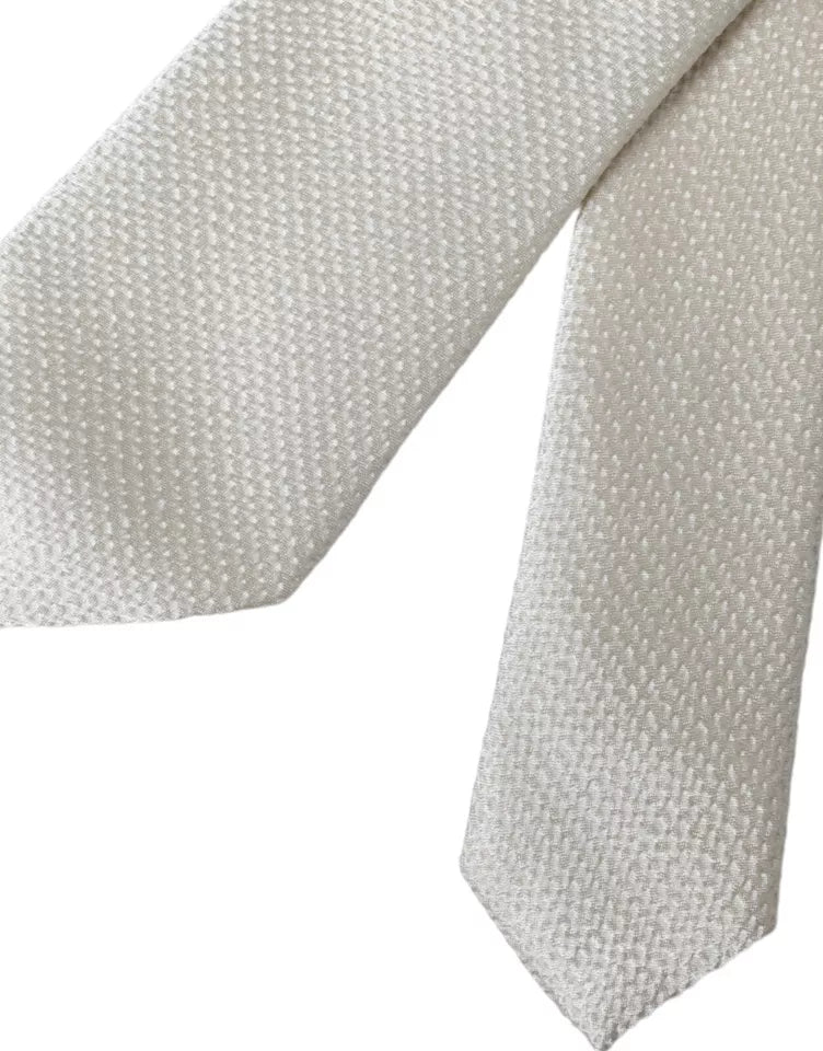 Elegant Dolce & Gabbana off-white silk necktie with adjustable length for men, featuring a smooth, luxurious texture.