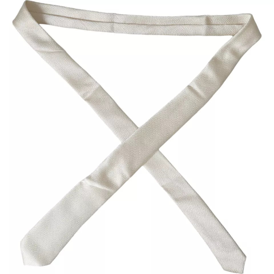 Elegant Dolce & Gabbana off-white silk adjustable men's necktie, showcasing smooth fabric and classic design.