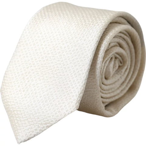 Dolce & Gabbana off-white 100% silk adjustable men's necktie with subtle sheen and classic design.