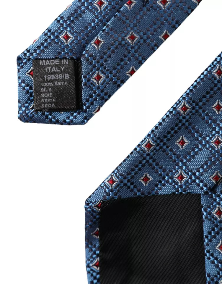 Blue patterned 100% silk men's tie by Dolce & Gabbana, featuring an adjustable design and elegant floral pattern.
