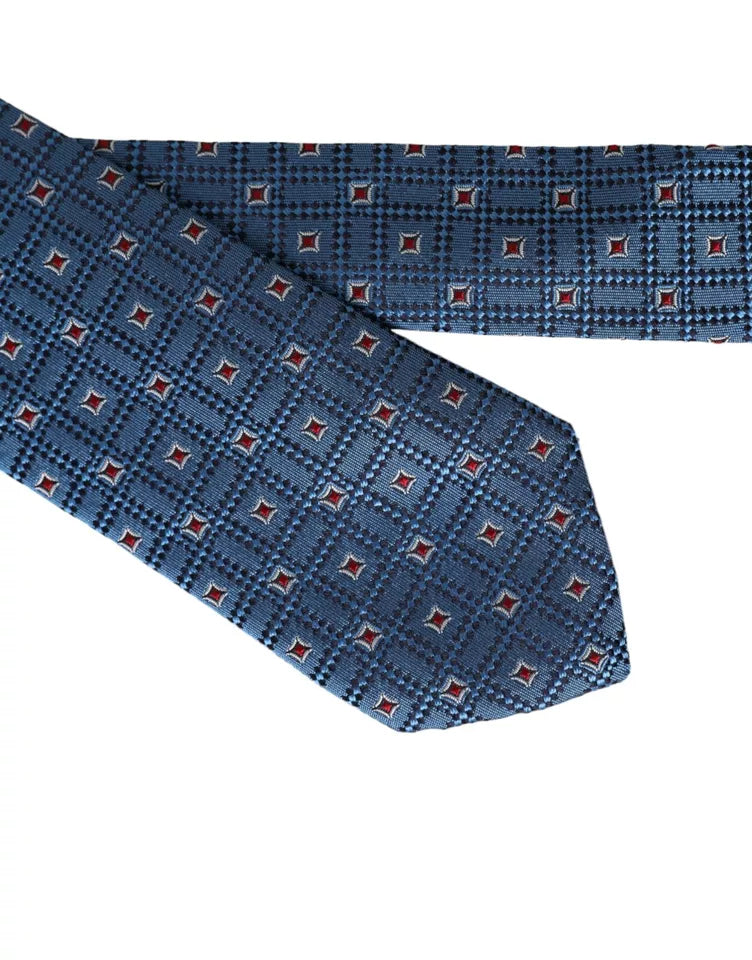 Blue patterned 100% silk men's tie by Dolce & Gabbana featuring an adjustable design and elegant pattern.