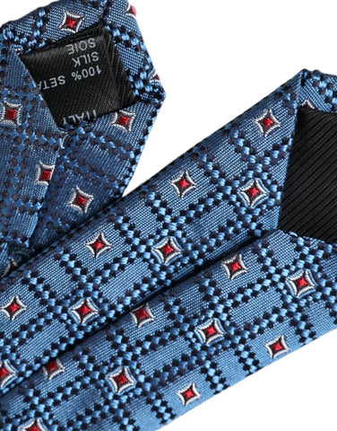Blue patterned 100% silk men's tie by Dolce & Gabbana, featuring an adjustable design and elegant, vibrant pattern.