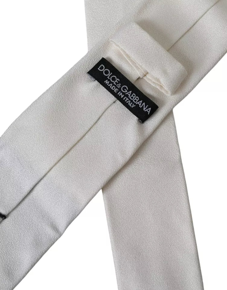 White silk classic adjustable men's tie by Dolce & Gabbana, featuring a smooth, elegant fabric with a sleek design.