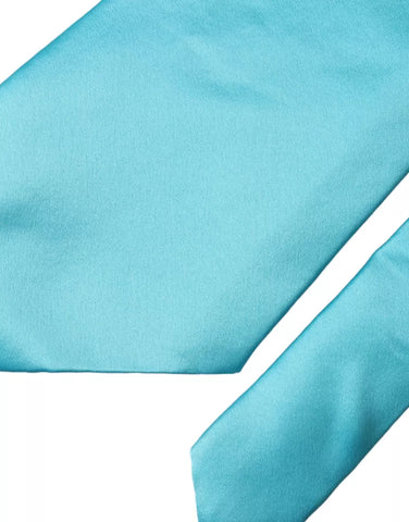 Light blue satin silk men's tie by Dolce & Gabbana, wide adjustable design with a smooth, shiny finish.