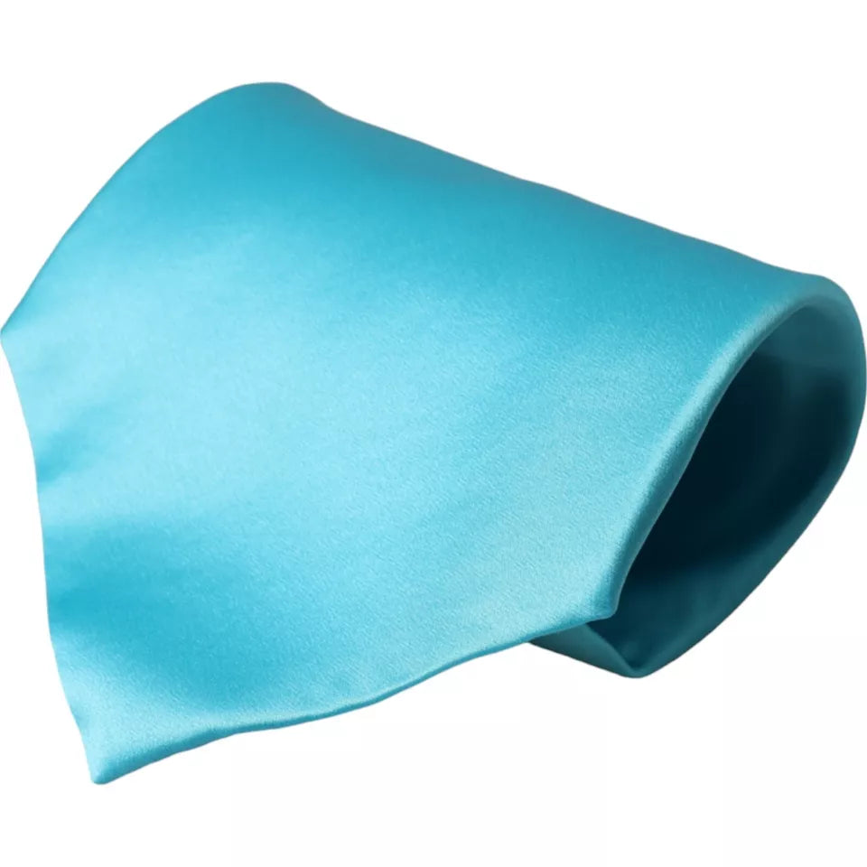 Light blue satin silk men's tie by Dolce & Gabbana, wide adjustable design with a smooth, shiny finish and elegant appearance.