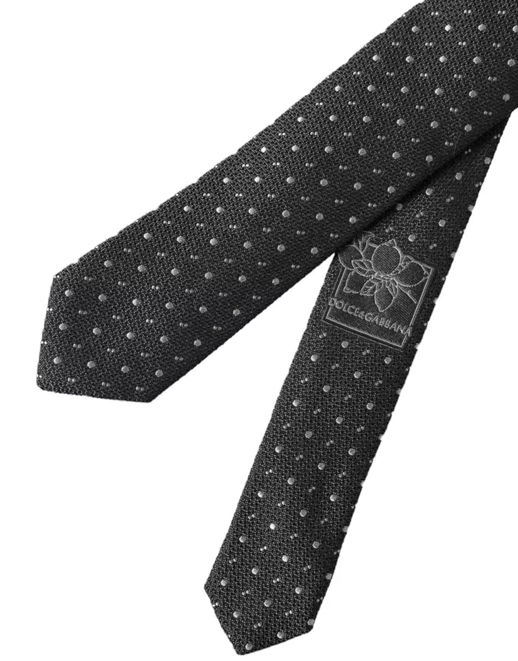 Black polka dot silk adjustable men's tie by Dolce & Gabbana, featuring a sleek design and classic pattern.