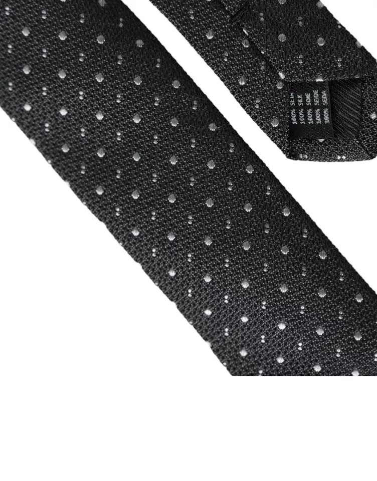 Black polka dot silk adjustable men's tie by Dolce & Gabbana, featuring a classic pattern and sleek design.