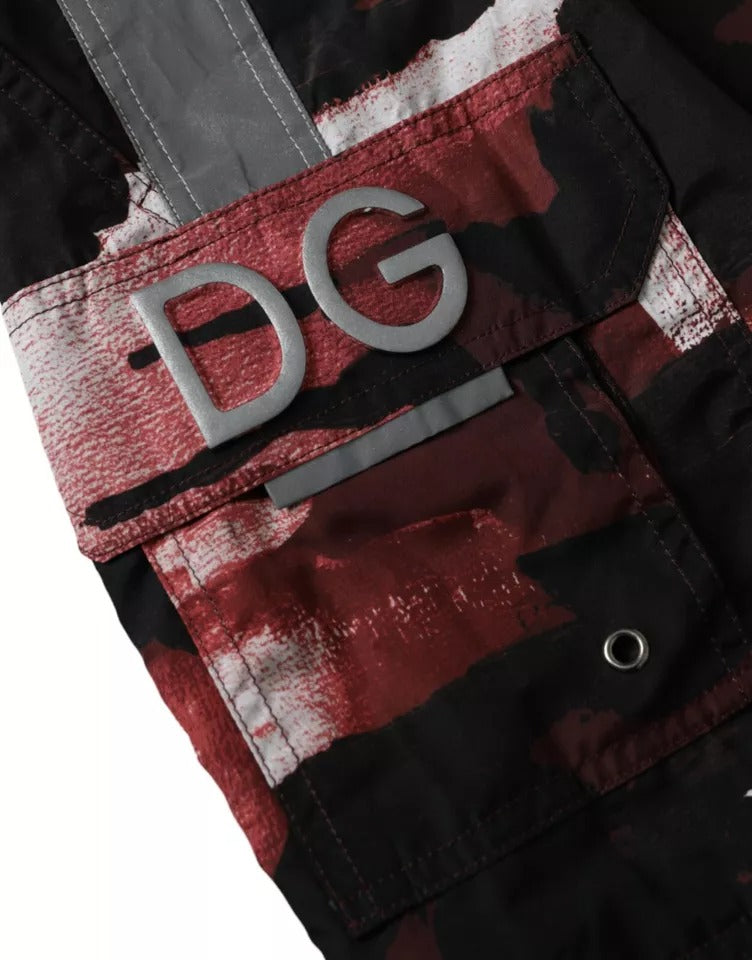 Multicolor camouflage Dolce & Gabbana logo beachwear shorts with swimwear fabric, featuring a vibrant camo pattern and sporty fit.