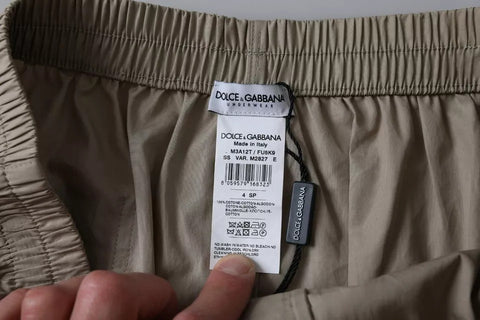 Brown cotton Dolce & Gabbana boxer shorts underwear laid flat, showing the classic design and soft fabric.