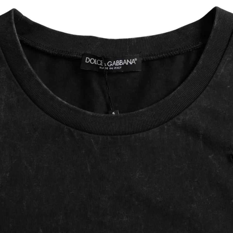 Black cotton crew neck T-shirt with bold graphic print from Dolce & Gabbana, shown on a plain background.