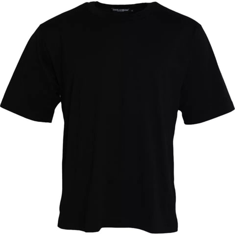 Black cotton crew neck T-shirt with embossed Dolce & Gabbana logo on chest, casual style, front view.