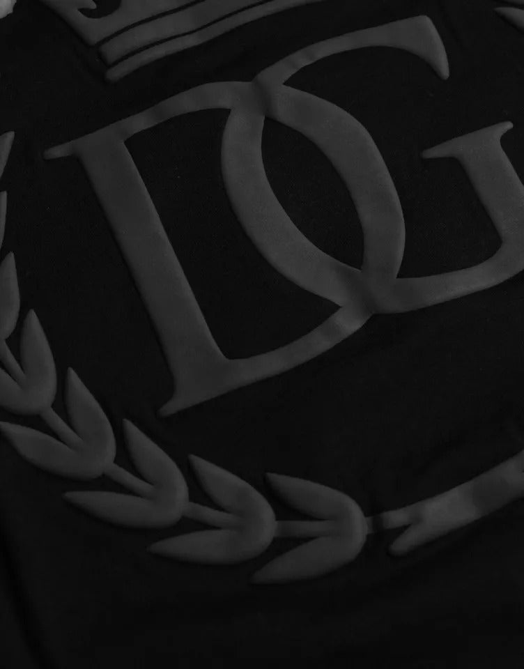 Black cotton crew neck T-shirt with embossed Dolce & Gabbana logo on chest, casual and stylish men's T-shirt.