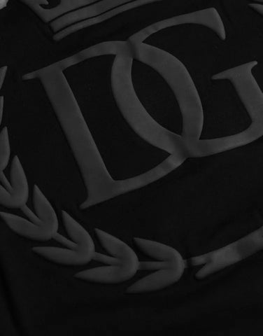 Black cotton crew neck T-shirt with embossed Dolce & Gabbana logo on chest, casual and stylish men's T-shirt.