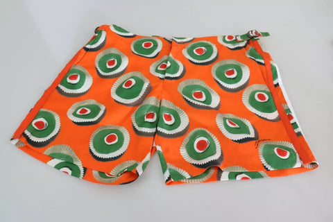 Orange cupcake print Dolce & Gabbana beachwear shorts with a relaxed fit, perfect for swimming or lounging by the pool.