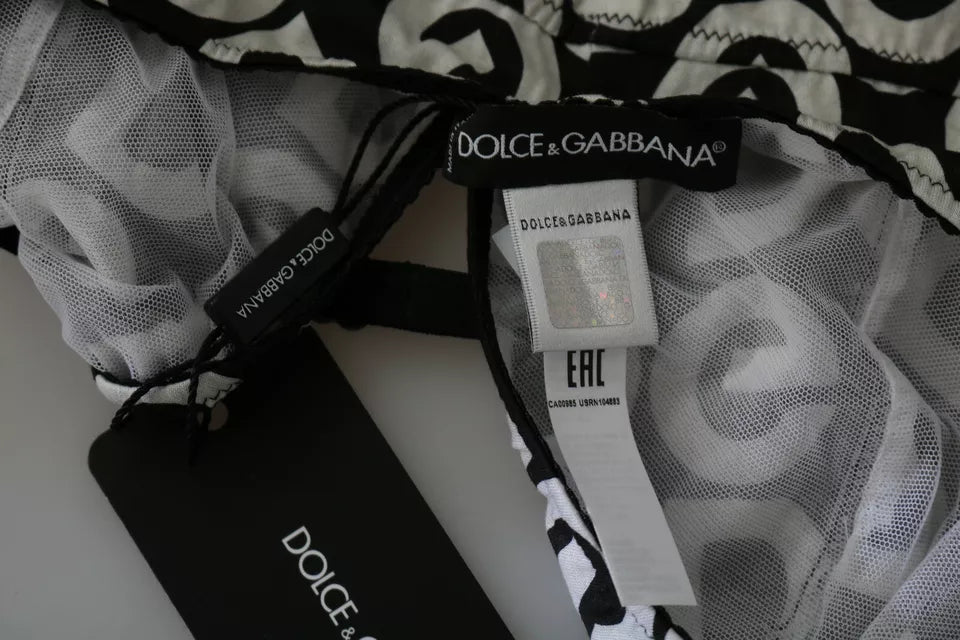 Black DG Mania print sleeveless swimwear by Dolce & Gabbana, showcasing a stylish swimwear design with bold patterns.