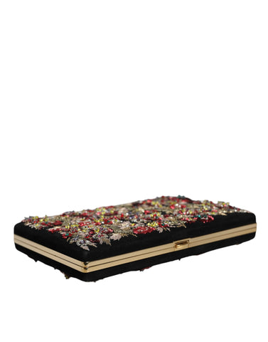 Multicolor floral pattern gold frame clutch evening purse by Dolce & Gabbana, featuring a vibrant floral design and elegant gold clasp.