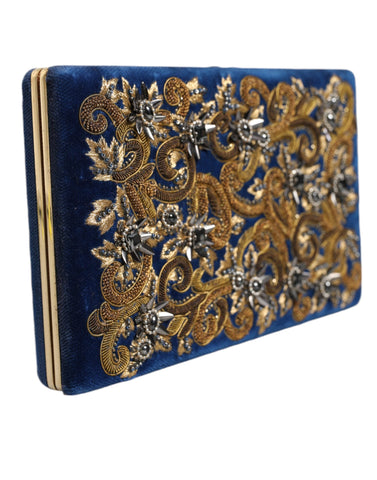 Blue velvet clutch purse with gold frame, elegant evening party bag by Dolce & Gabbana, featuring a sleek, luxurious design.