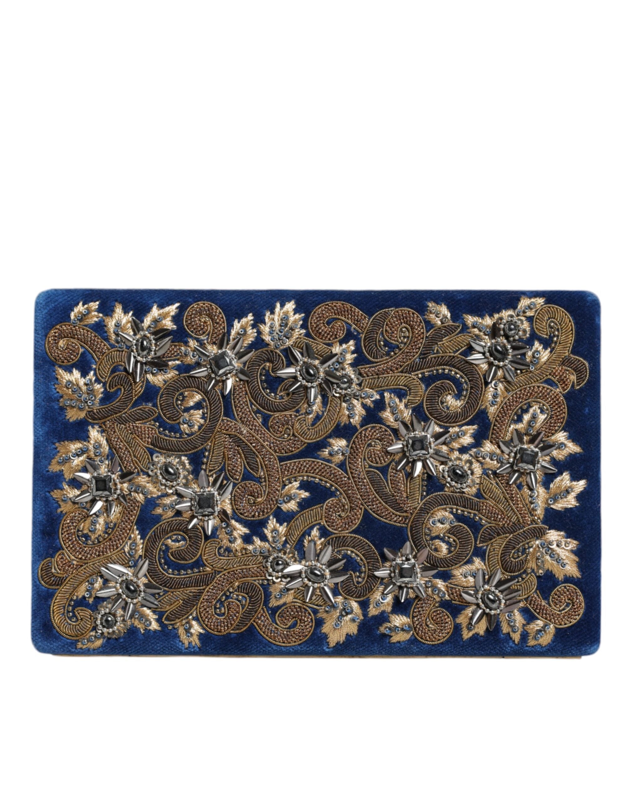 Blue velvet clutch purse with a gold frame, designed by Dolce & Gabbana, perfect for evening parties and elegant occasions.
