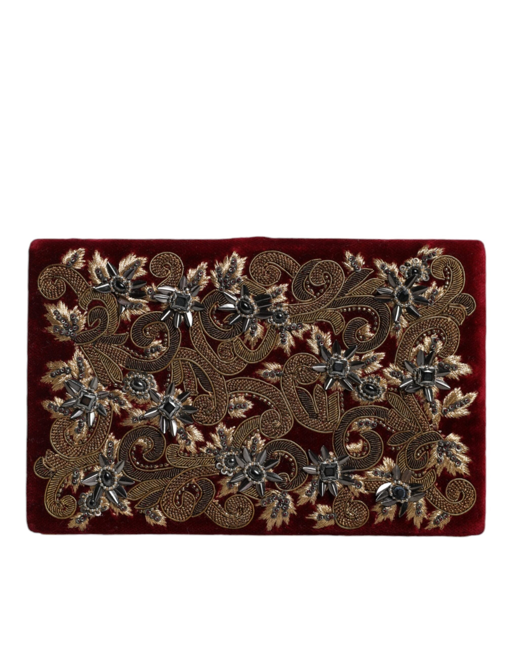 Red velvet clutch purse with gold frame, evening party bag by Dolce & Gabbana featuring elegant design and compact style.