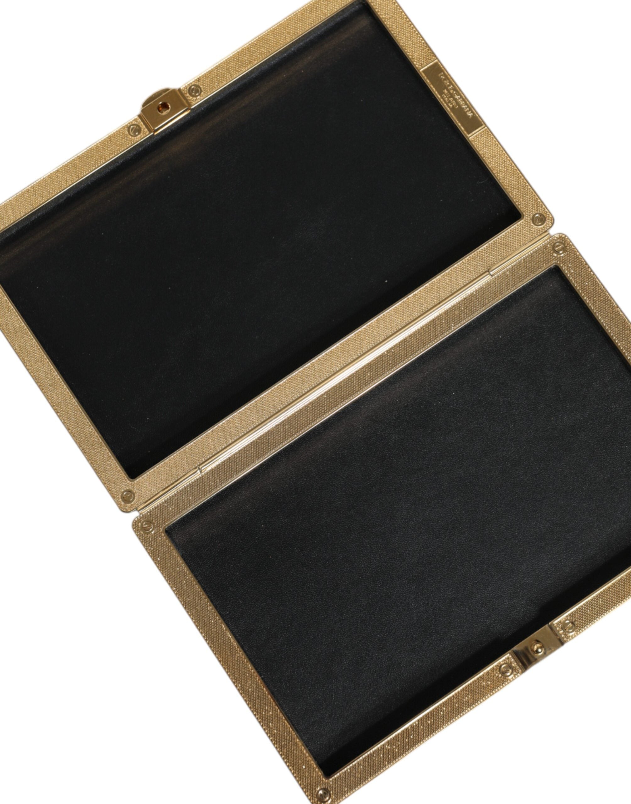 Black leather clutch bag with gold frame and stud detailing, designed for evening occasions by Dolce & Gabbana.