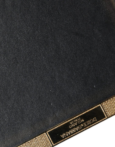 Gold crystal bifold clutch purse for women, elegant evening party bag by Dolce & Gabbana with sparkling details.