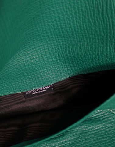Green leather Dolce & Gabbana mini clutch purse with pouch design, suitable as a tablet case or small handbag accessory.
