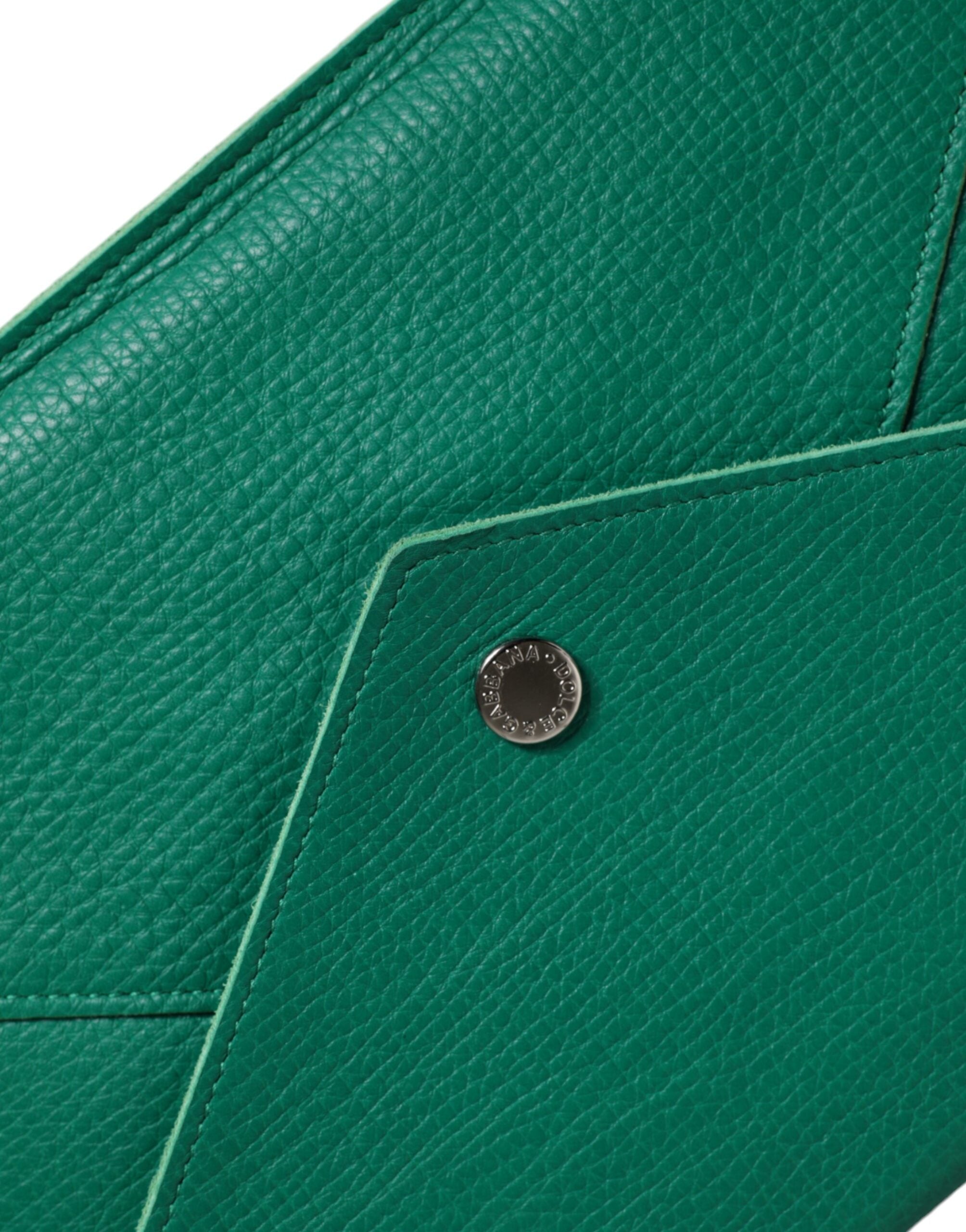 Green leather Dolce & Gabbana mini handbag clutch with pouch and tablet case, featuring a sleek compact design and elegant finish.