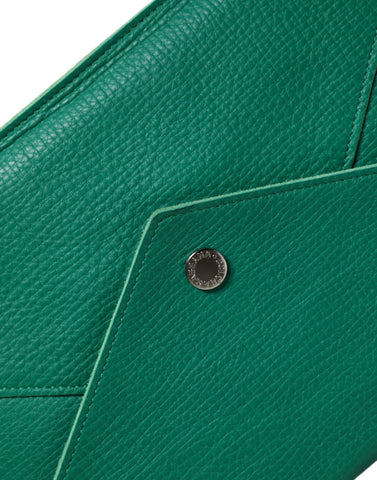 Green leather Dolce & Gabbana mini handbag clutch with pouch and tablet case, featuring a sleek compact design and elegant finish.