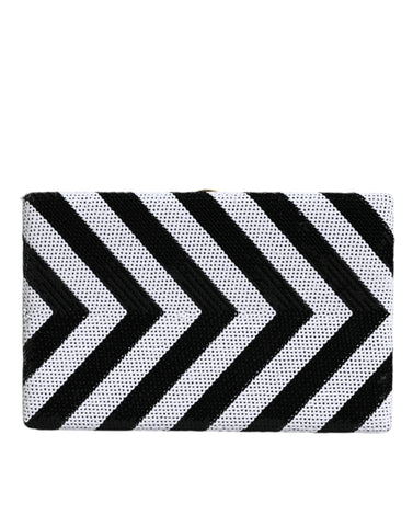 Black and white gold frame clutch purse by Dolce & Gabbana, featuring a sleek evening party design with elegant gold accents.