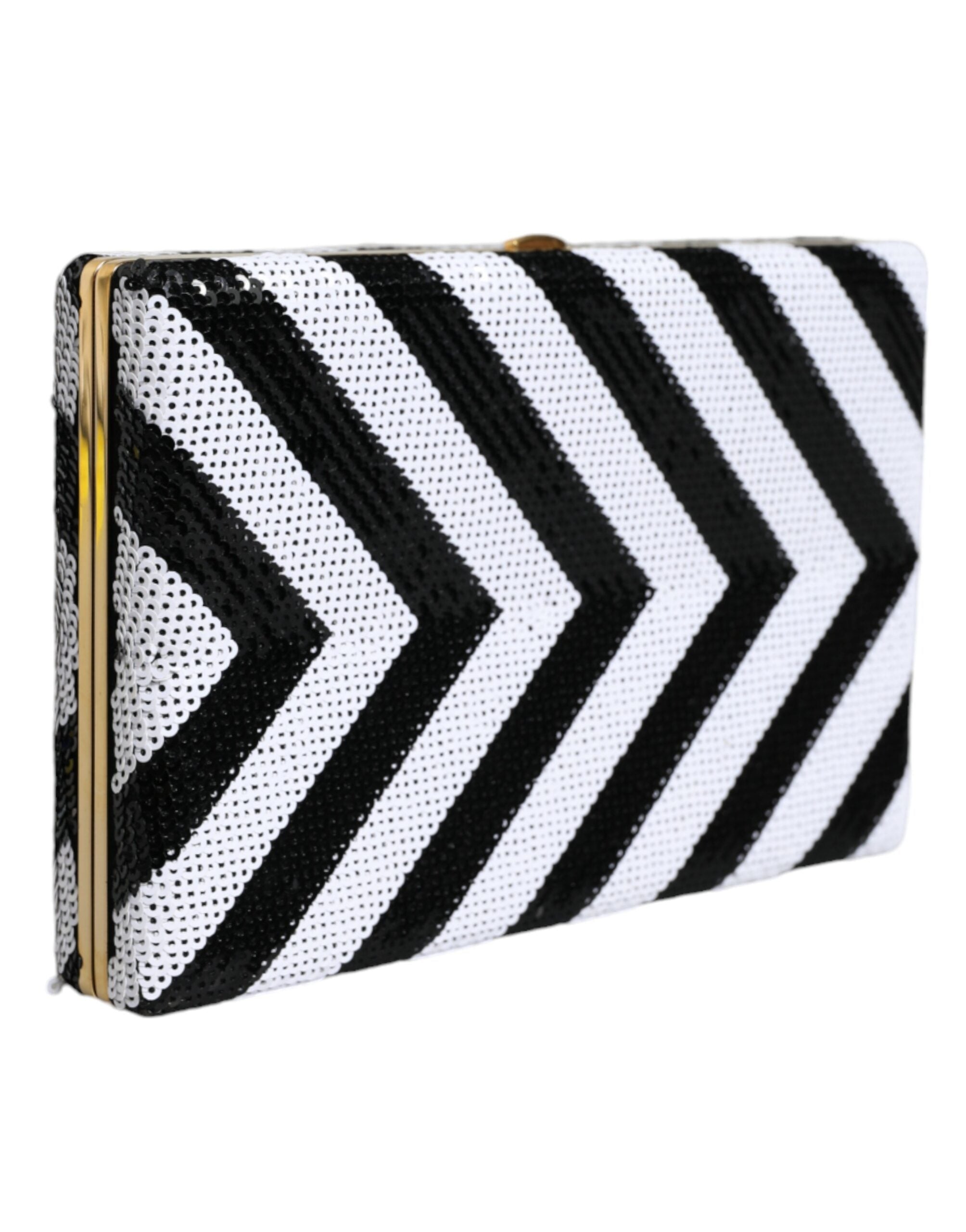 Black and white gold frame clutch purse by Dolce & Gabbana, featuring a sleek evening party purse bag with elegant design.