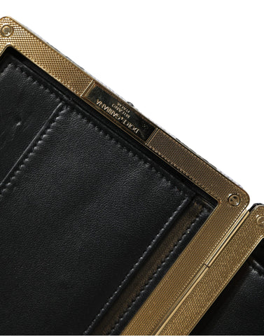 Dolce & Gabbana black and white gold frame clutch purse for evening parties, featuring elegant design and structured style.