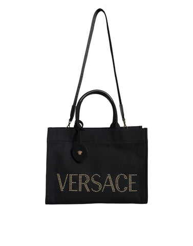 Versace black canvas and leather crossbody tote bag with top handle and logo detail, stylish and functional for everyday use.