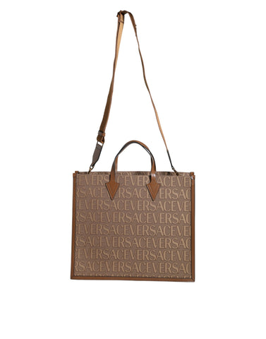 Brown Versace top handle jacquard leather crossbody tote bag with logo, featuring a structured design and elegant handles.