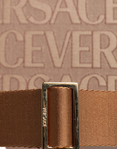 Versace brown top handle jacquard leather logo crossbody tote bag with structured shape and adjustable strap.