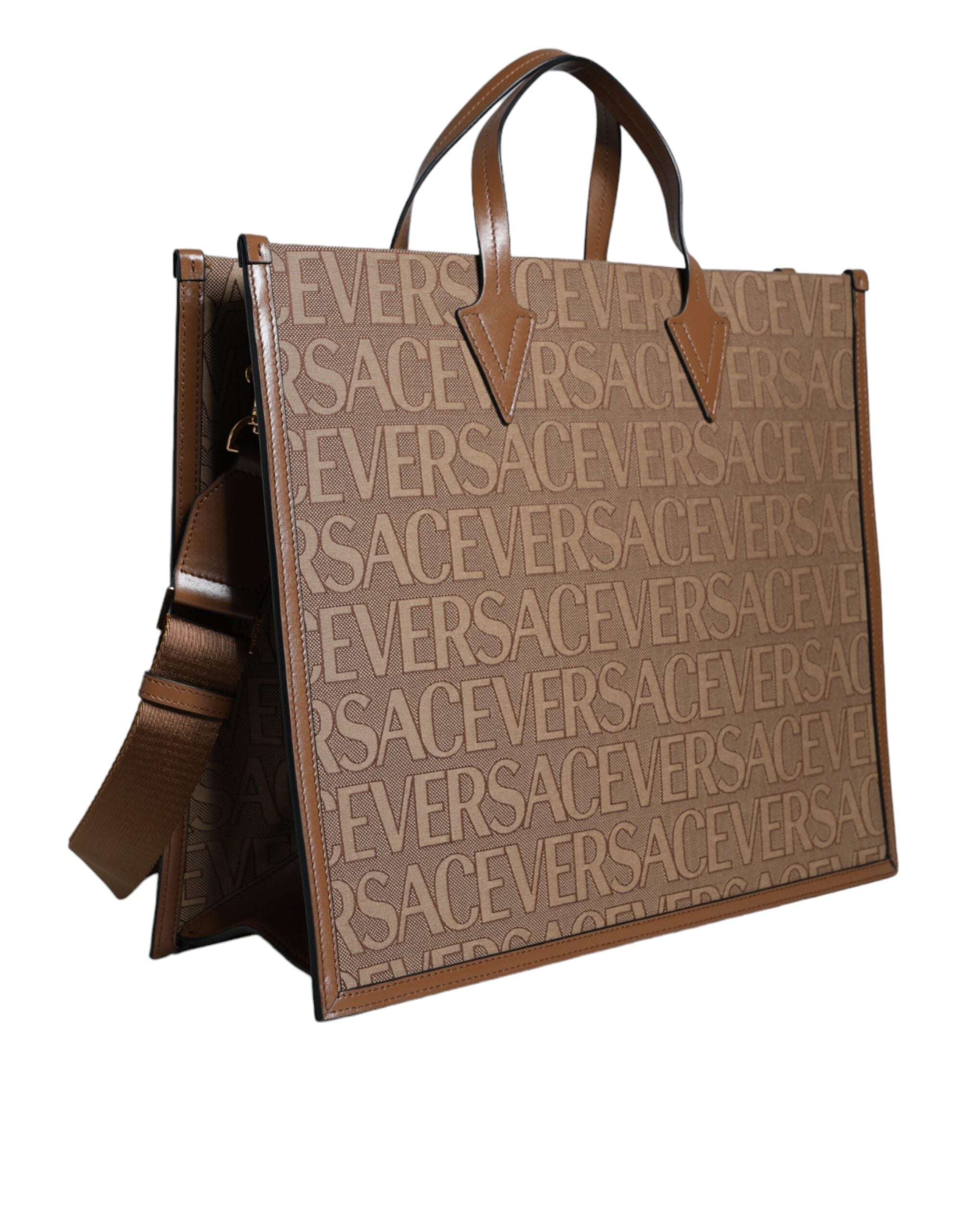 Brown Versace Jacquard leather crossbody tote bag with top handle and logo detailing.