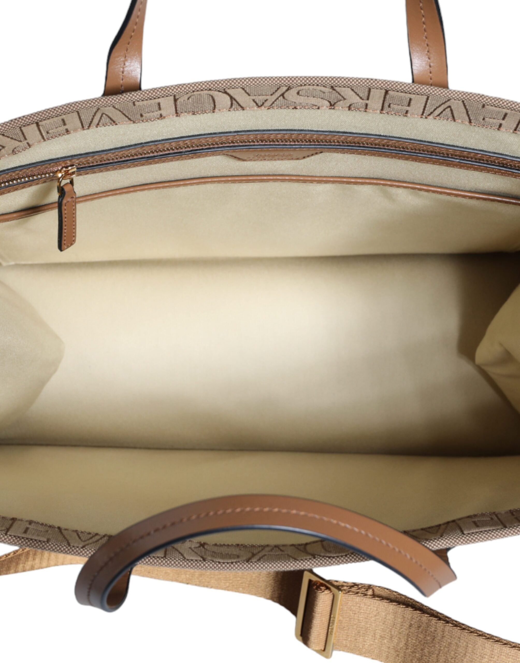 Brown Versace crossbody tote bag with top handle, jacquard leather logo design and spacious interior for everyday use.