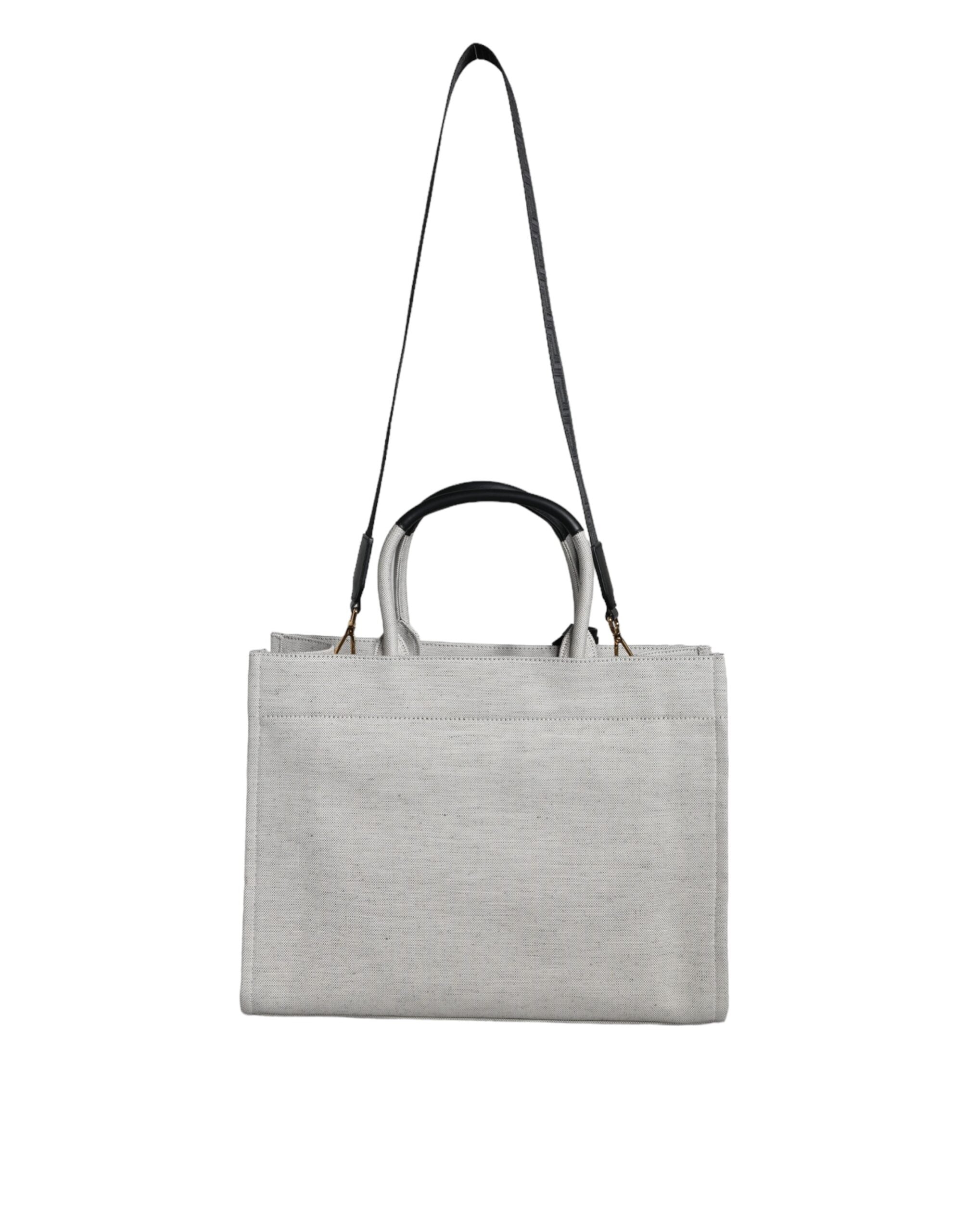 Versace white leather and canvas crossbody tote bag with top handle and logo detail, stylish and spacious for everyday use.