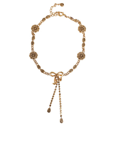 Gold tone brass waist chain belt with crystal embellishments from Dolce & Gabbana, featuring intricate design and elegant detailing.