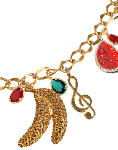 Gold tone brass waist chain belt with fruity crystal embellishments, designed by Dolce & Gabbana.