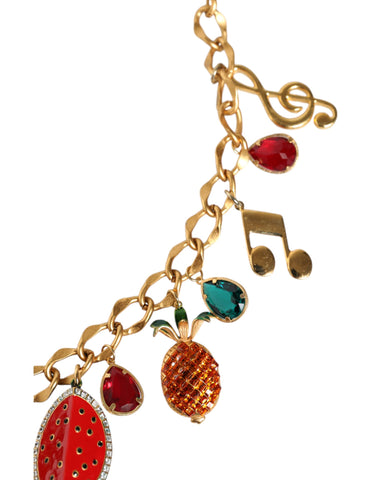 Gold tone brass waist chain belt with fruity crystal embellishments, styled by Dolce & Gabbana.