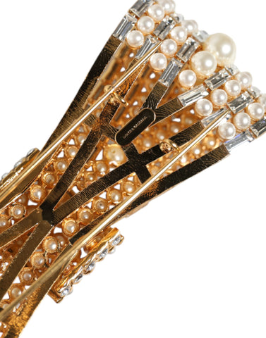 Gold tone brass brooch with crystal embellishments and faux pearl accents, designed by Dolce & Gabbana.